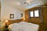 Discover the charm of this cozy bedroom, perfect for a relaxing getaway.