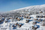 Discover the charm of this stunning mountain property, nestled in a winter wonderland.