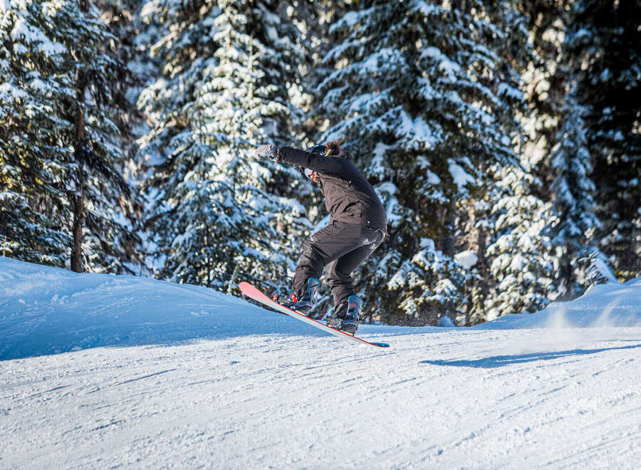 Experience the thrill of winter sports with this stunning property! Nestled in a snowy wonderland, this location offers unparalleled access to snowboarding and skiing.