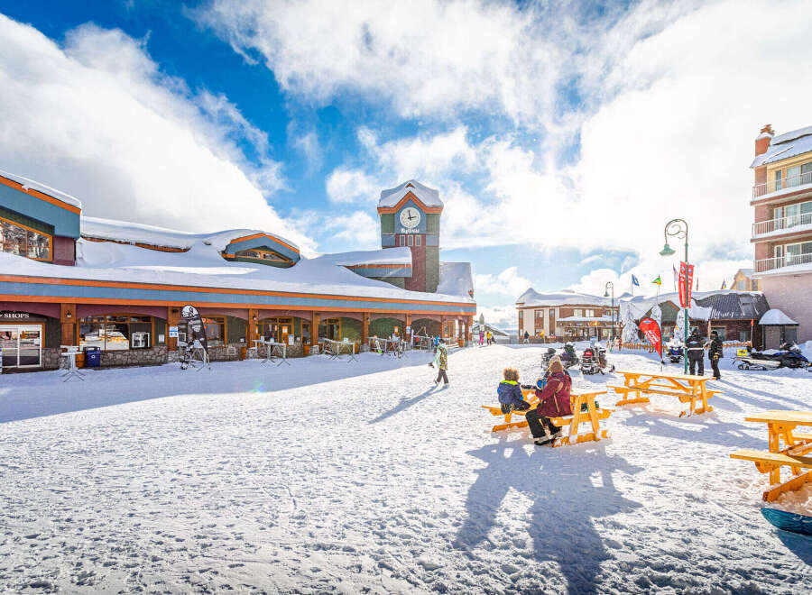 Explore the charm of this winter wonderland property, ideally situated near ski slopes and offering stunning mountain views.