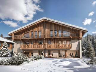 This stunning chalet-style property offers a luxurious retreat in a snowy landscape.