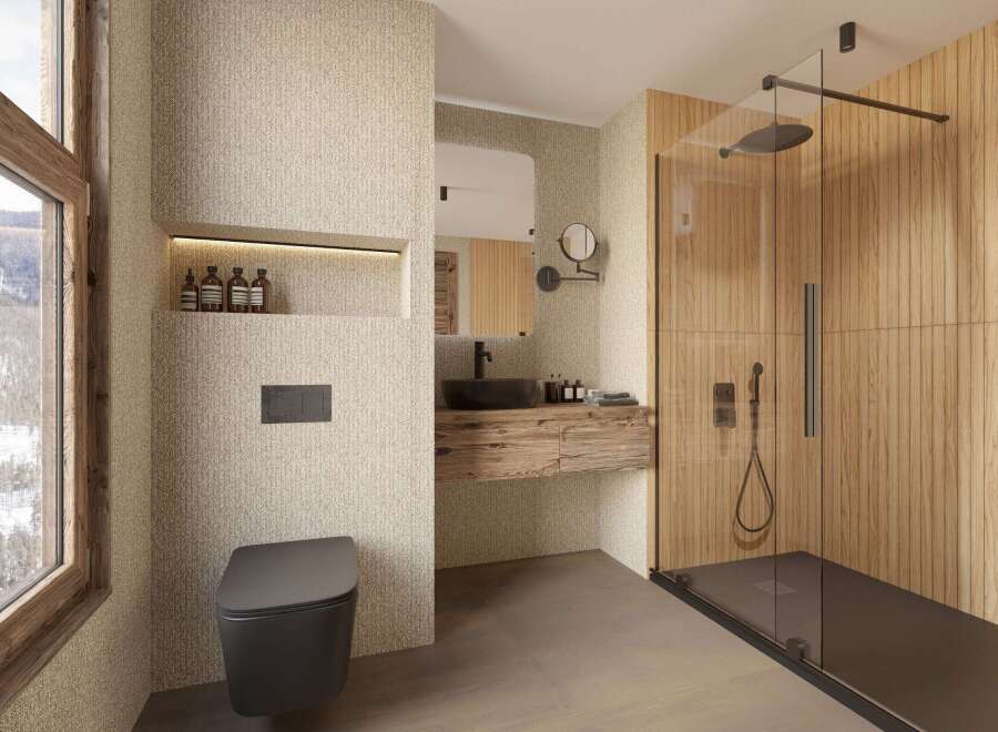 Experience luxury in this stunning bathroom, featuring a sleek black toilet and a modern shower with glass doors.
