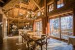 Experience the epitome of luxury living in this stunning chalet, boasting exquisite wooden architecture and a warm, inviting ambiance.