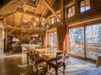 Experience the epitome of luxury living in this stunning chalet, boasting exquisite wooden architecture and a warm, inviting ambiance.