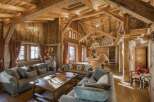 Experience the epitome of rustic luxury in this stunning wooden chalet.