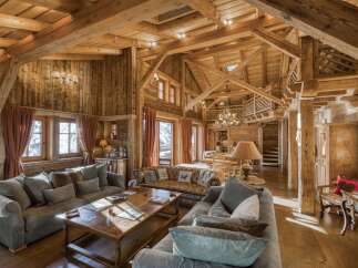 Experience the epitome of rustic luxury in this stunning wooden chalet.