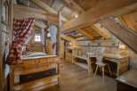 Step into a cozy alpine retreat with this charming bedroom.