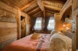 Step into rustic charm with this cozy bedroom.