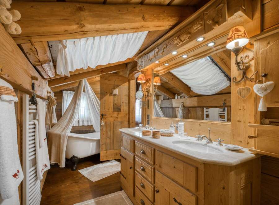 Step into rustic elegance with this charming bathroom.