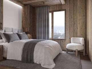 Experience the warmth and charm of this cozy bedroom, featuring rustic wooden accents and a serene ambiance.