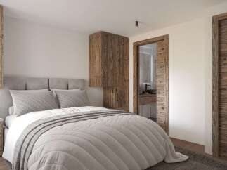 Experience the epitome of rustic elegance in this stunning bedroom.