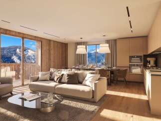Experience luxurious mountain living in this stunning open-concept apartment, featuring a spacious living area with a plush sofa and armchair, perfect for relaxing after a day on the slopes.