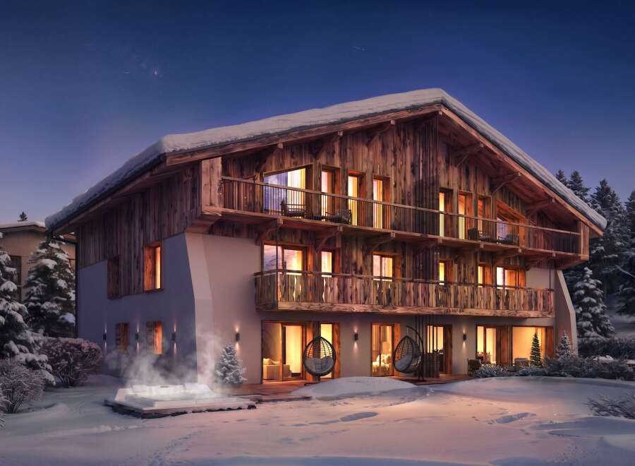 Experience luxury mountain living in this stunning chalet, featuring a private outdoor hot tub perfect for soaking in the snowy landscape.