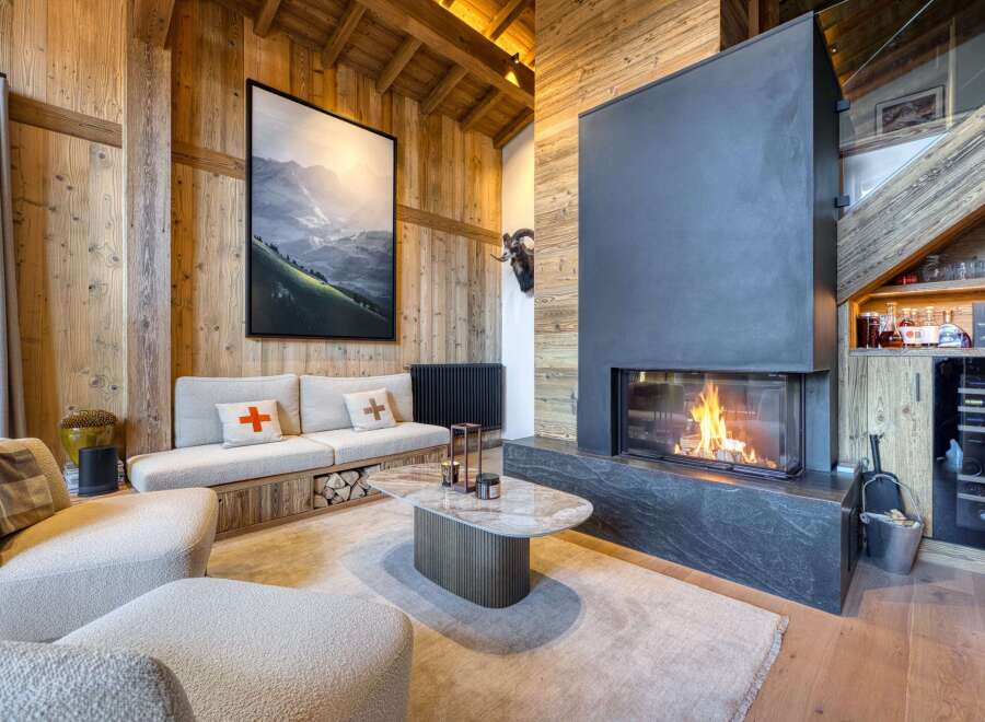 Experience luxury living in this stunning property featuring a cozy fireplace, perfect for chilly evenings.