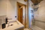 Step into luxury with this stunning bathroom featuring a sleek, modern design.