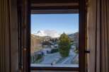 Enjoy breathtaking mountain views from this charming property.