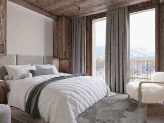 Experience the epitome of alpine luxury in this stunning bedroom.