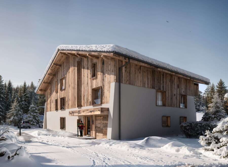 This stunning chalet-style home offers a perfect blend of rustic charm and modern comfort.