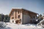 This stunning chalet-style home offers a perfect blend of rustic charm and modern comfort.
