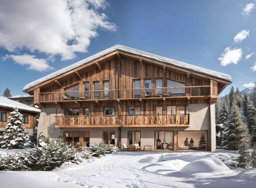 This stunning chalet-style property offers a luxurious retreat in a snowy landscape.