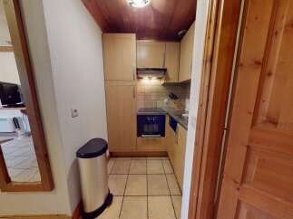 Discover this charming property featuring a well-equipped kitchen, perfect for preparing delicious meals.