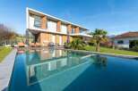 Experience luxury living in this stunning modern home.