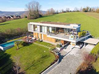 Discover modern luxury in this stunning property featuring a sleek design and breathtaking views.