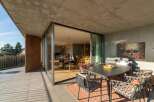 Experience luxury living with this stunning property featuring a spacious outdoor terrace.