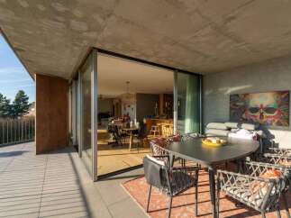 Experience luxury living with this stunning property featuring a spacious outdoor terrace.