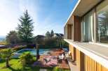 Experience luxury living in this stunning property with a private pool and expansive outdoor deck.