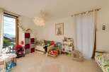 This charming children's room offers a bright and inviting space for play and relaxation.
