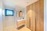 Step into modern luxury with this stunning bathroom.