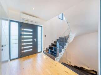 Step into modern elegance with this stunning property.