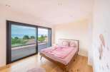 This stunning bedroom offers breathtaking views and a serene atmosphere.