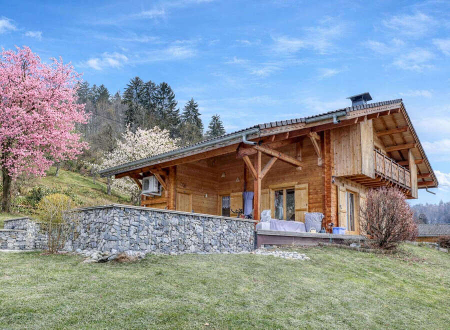 Discover the charm of this stunning wooden cabin nestled in a picturesque setting.