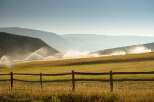 This stunning property features a vast, irrigated field, perfect for agricultural endeavors.