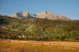 Discover the tranquility of this stunning property, nestled against a backdrop of majestic mountains.