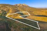 Discover the beauty of this expansive property, perfect for building your dream home or creating a private retreat.