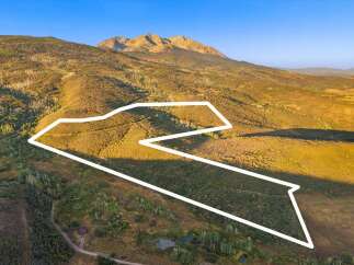 Discover the beauty of this expansive property, perfect for building your dream home or creating a private retreat.