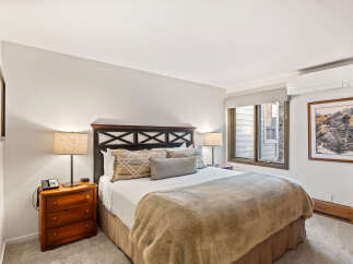 Experience comfort and style in this inviting bedroom.