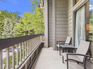 Enjoy the fresh mountain air from this charming balcony, perfect for morning coffee or evening relaxation.
