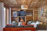 Step into a cozy chalet retreat with this inviting living space.