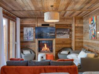 Step into a cozy chalet retreat with this inviting living space.