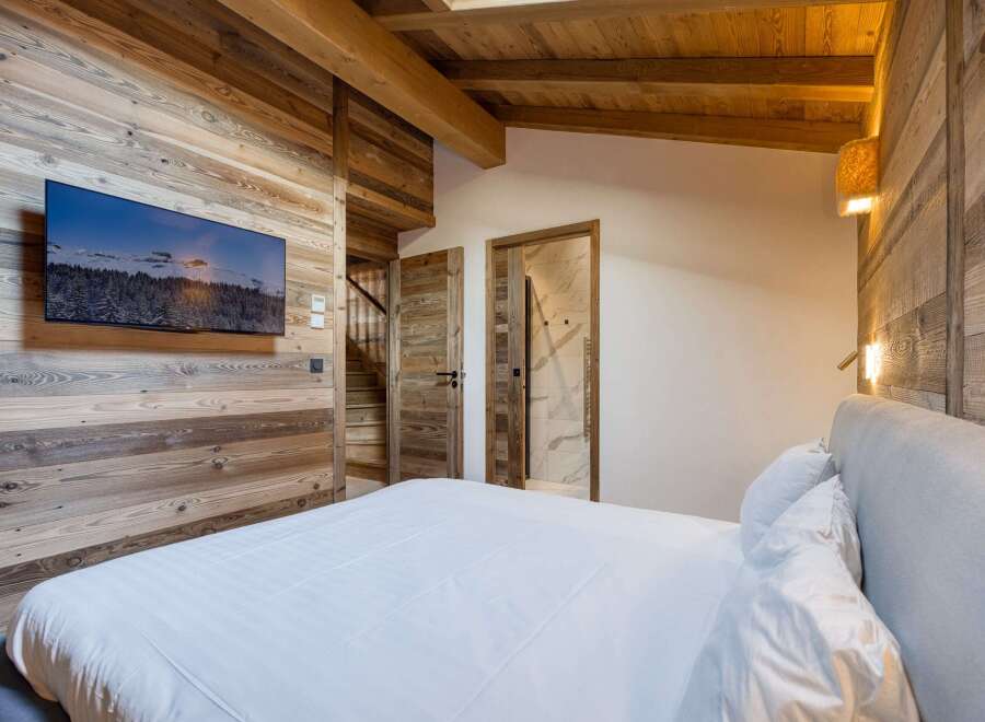 Experience rustic elegance in this stunning bedroom.