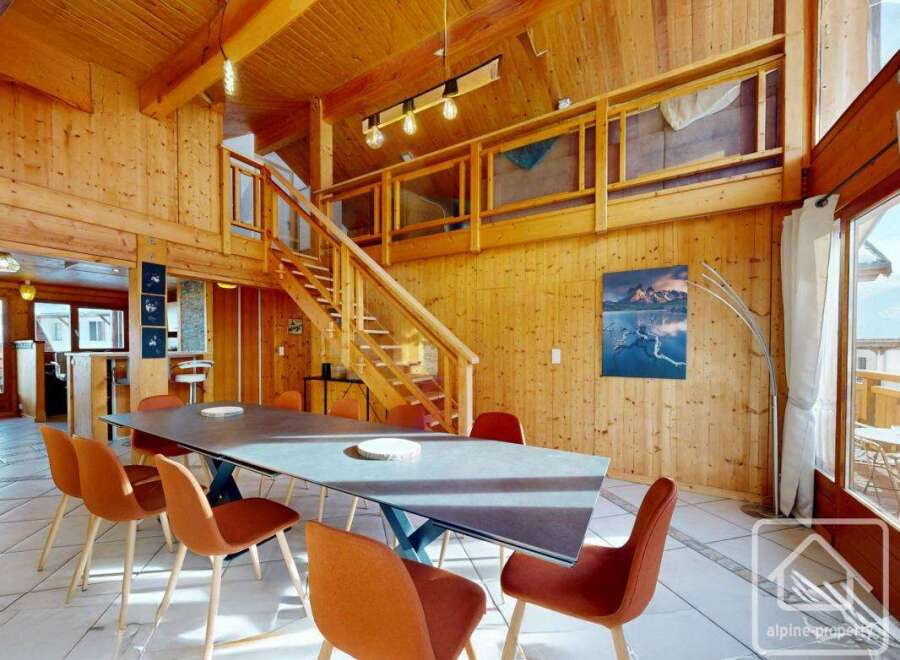 Experience the warmth of this stunning wooden chalet, perfect for a luxurious getaway.