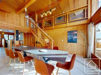 Experience the warmth of this stunning wooden chalet, perfect for a luxurious getaway.