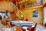 Experience the charm of this stunning property, featuring a spacious dining area perfect for gatherings.