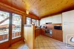 Discover the charm of this stunning property, featuring a cozy kitchen with wooden accents and modern appliances.