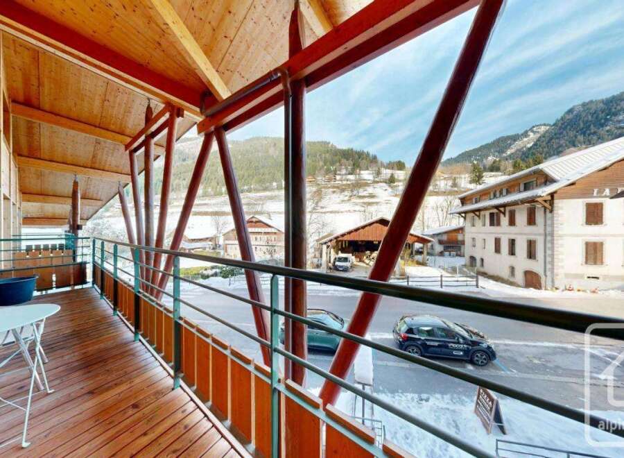 Experience the charm of this stunning property with its inviting balcony and breathtaking mountain views.