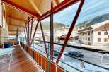 Experience the charm of this stunning property with its inviting balcony and breathtaking mountain views.
